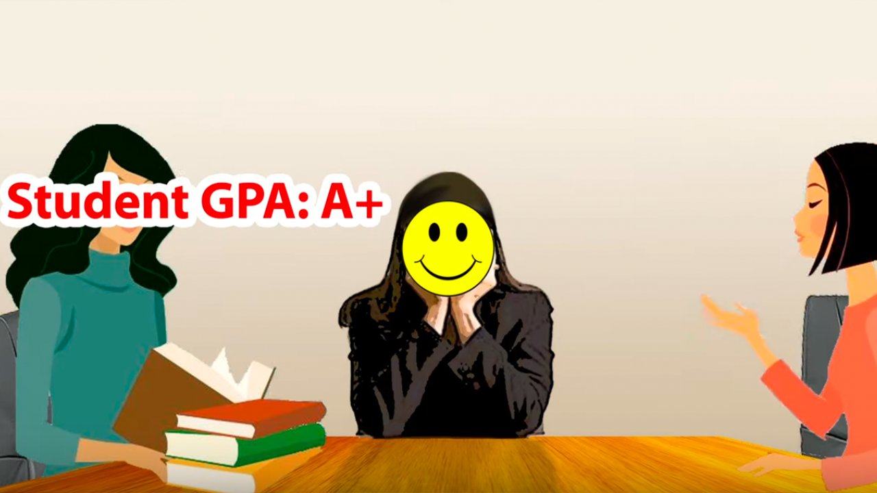 cartoon image of a sad young girl wearing a yellow mask with a smile on it who is a student wearing black at a wooden table. One each side of her are young women reading a stack of books and talking to her.